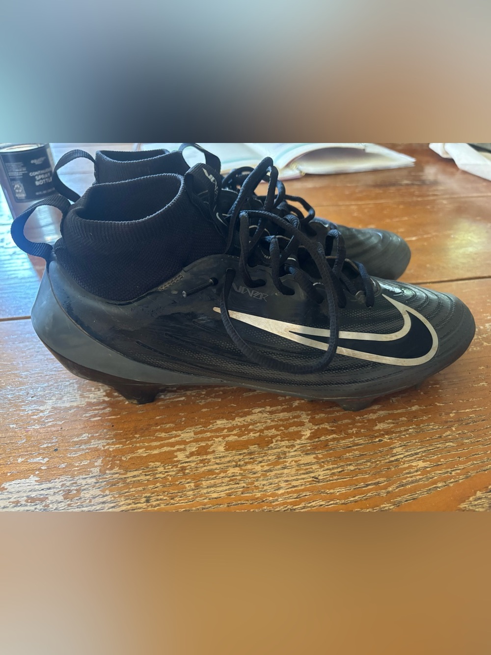 Nike Black Football Cleats with Silver Swoosh